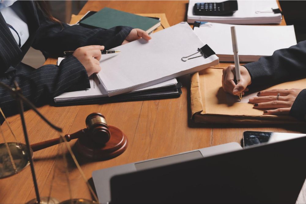 going-over-evidence - Lackey & Miller, LLC Challenge a Burglary Charge